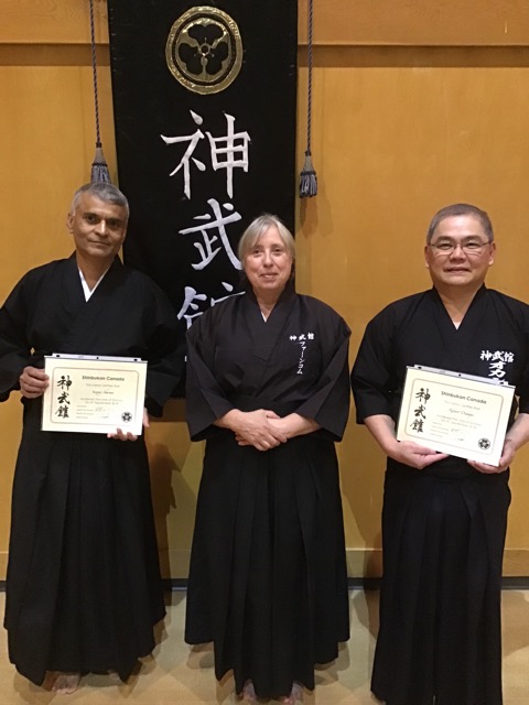 Sanjay Sharma and Robert Ocampo receiving kyu grading menjo